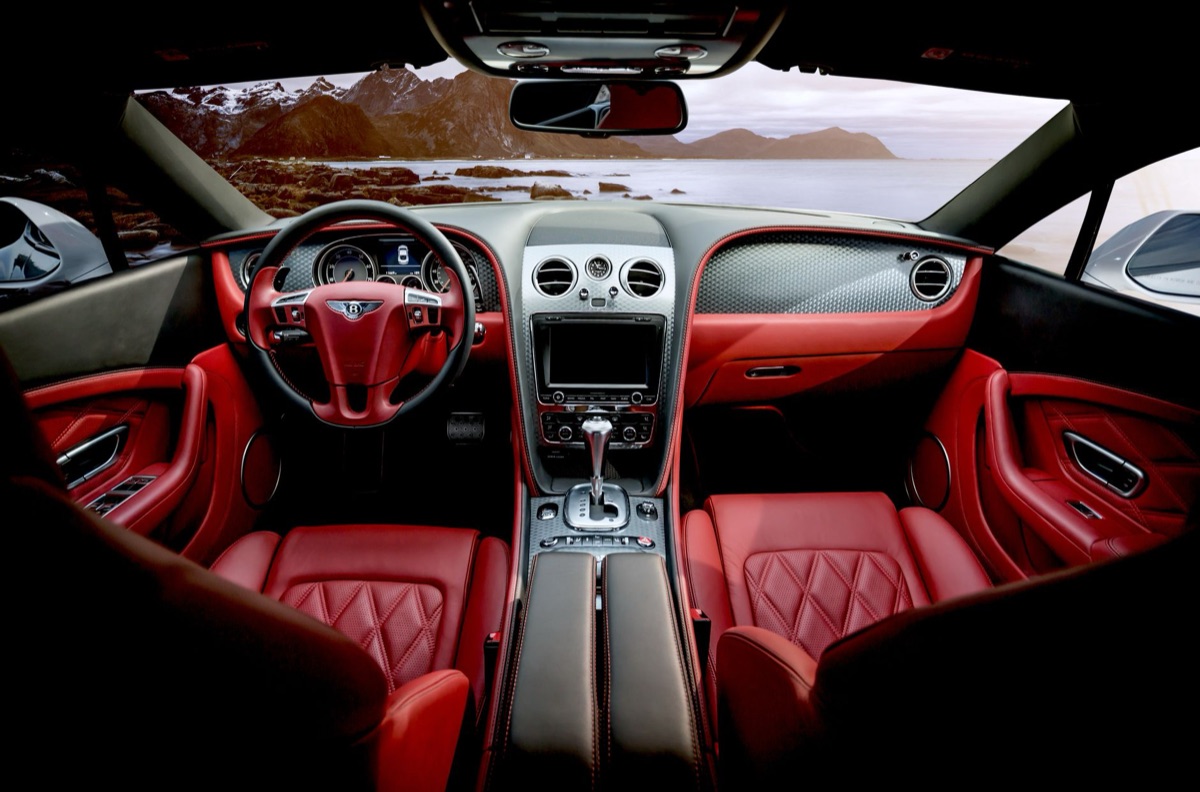 Close-up of a high-performance sports car cockpit and steering wheel