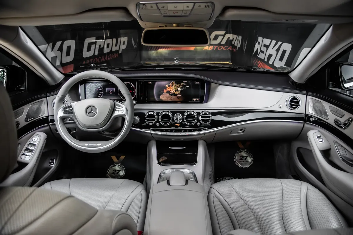 Explore the premium interior of a Mercedes-Benz S-Class, showcasing luxurious leather seats and advanced technology.